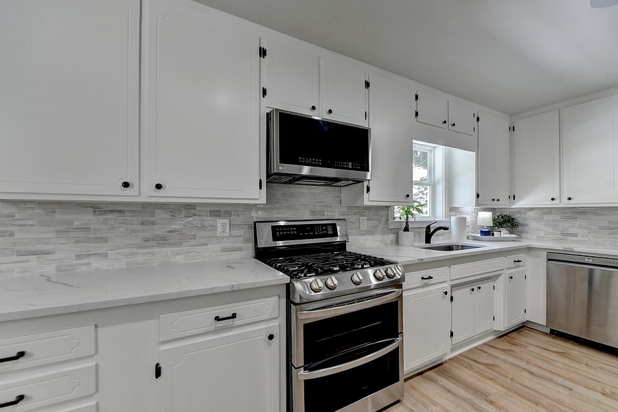 Quartz Countertops and Marble Backsplash