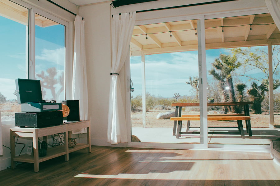 Sun-drenched living area with stunning views. A great spot for meditation or yoga.