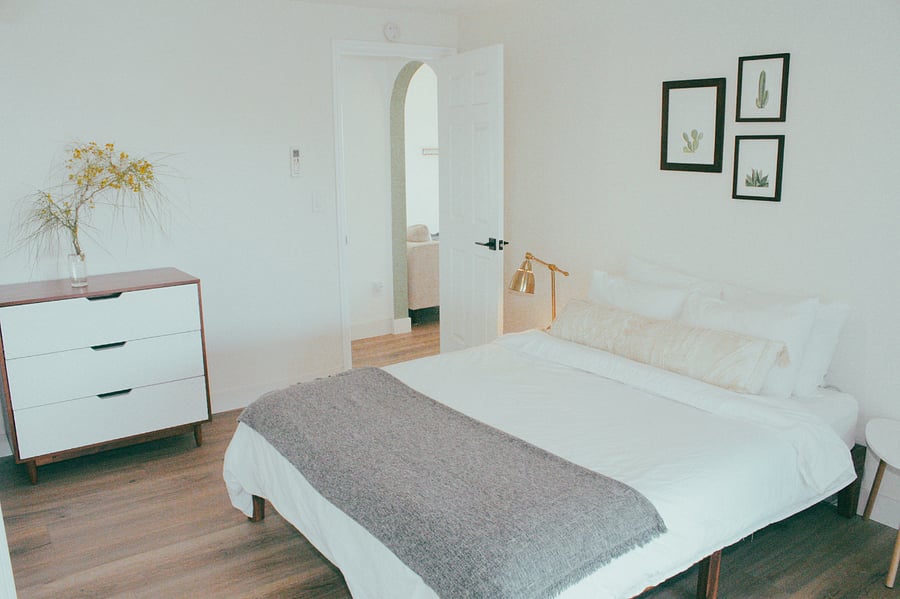 Master bedroom with ensuite full bathroom. Queen bed with Parachute brand linens.