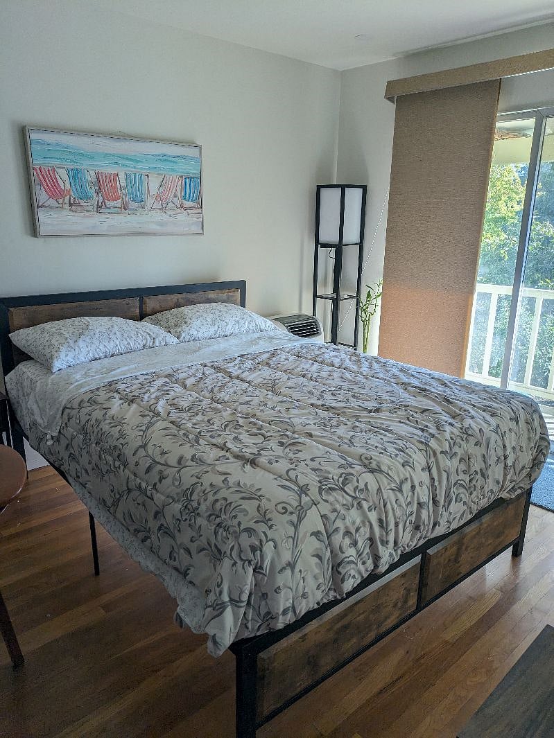 Lanai Room - Queen Size Bed with Electric Blinds.