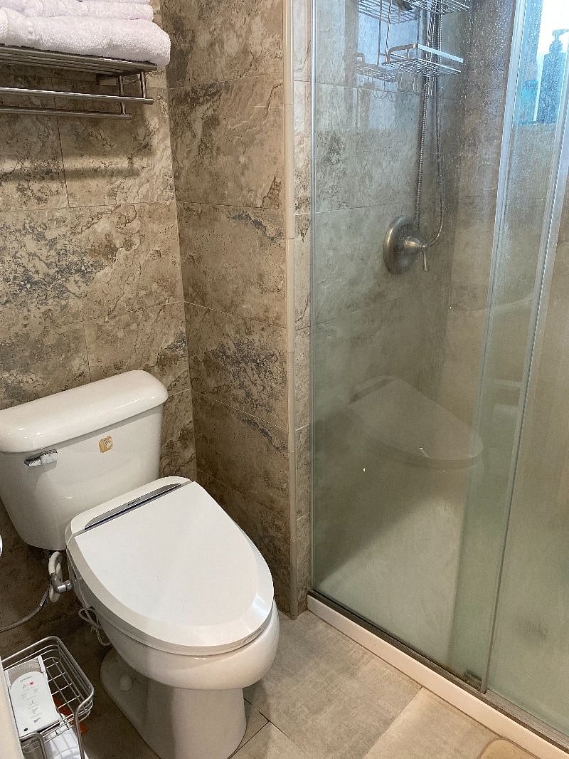 Shared Bathroom Two - Toilet with Bidet  Walk-in Shower