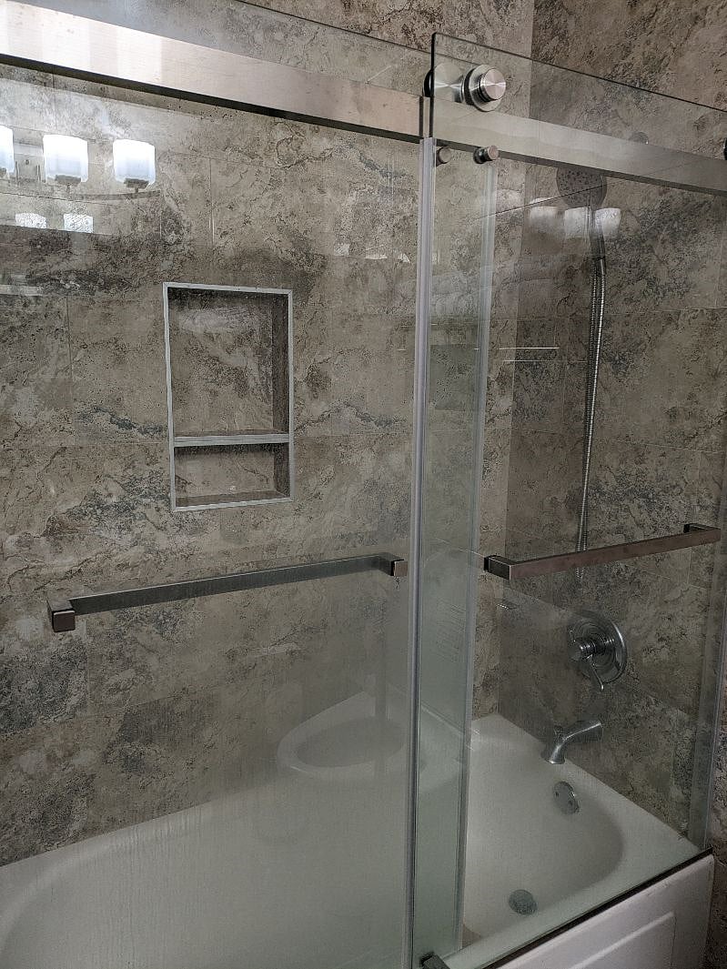 Shared Bathroom One - Single Sink and Vanity space.