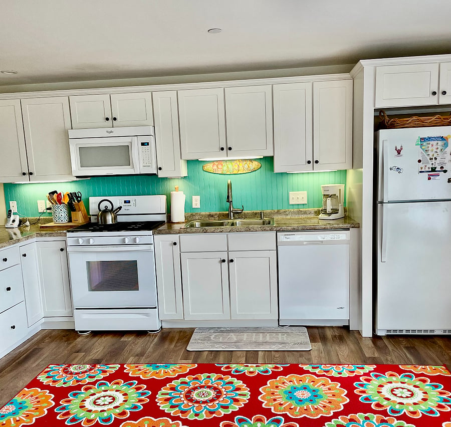 Enjoy fixing meals in our sunny and bright, fully equipted kitchen that includes all new appliances; gas stove and oven, microwave and refrigerator and dishwasher.