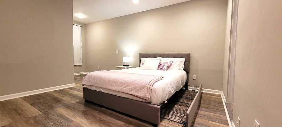 Bedroom 2 (downstairs) with underbed storage and huge walk in closet and black out shades