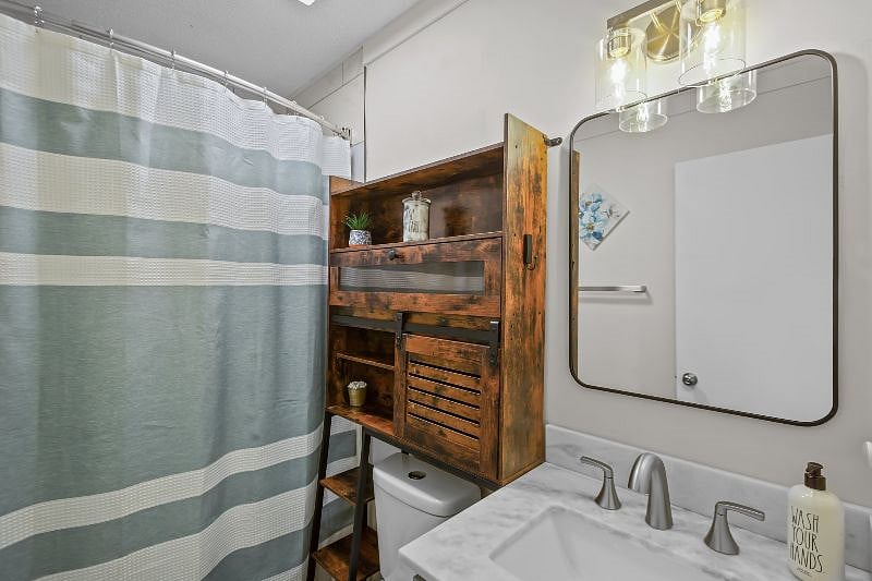Ample storage in bathroom with a DEEP, soaking tub.
