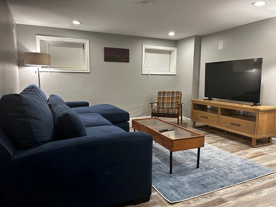 Private living room with 55" smart TV.