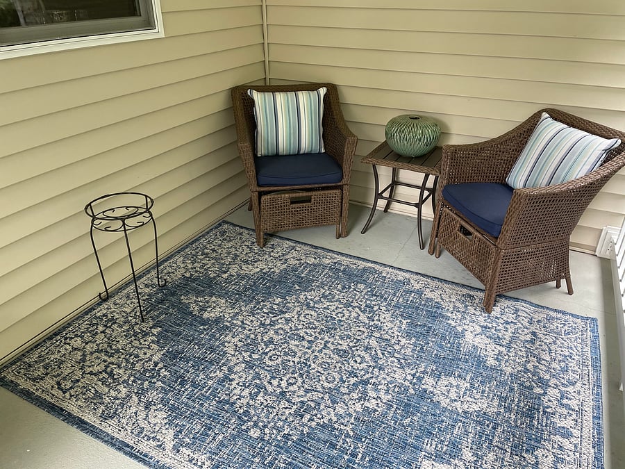 Great back deck overlooking the woods with ample seating for 3 total including these two chairs and table and additional rocking chair