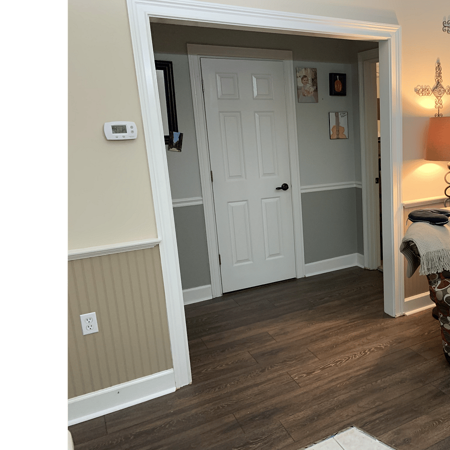 Hallway leading to bedrooms and main bathroom with LVP flooring on Livingroom and hallway