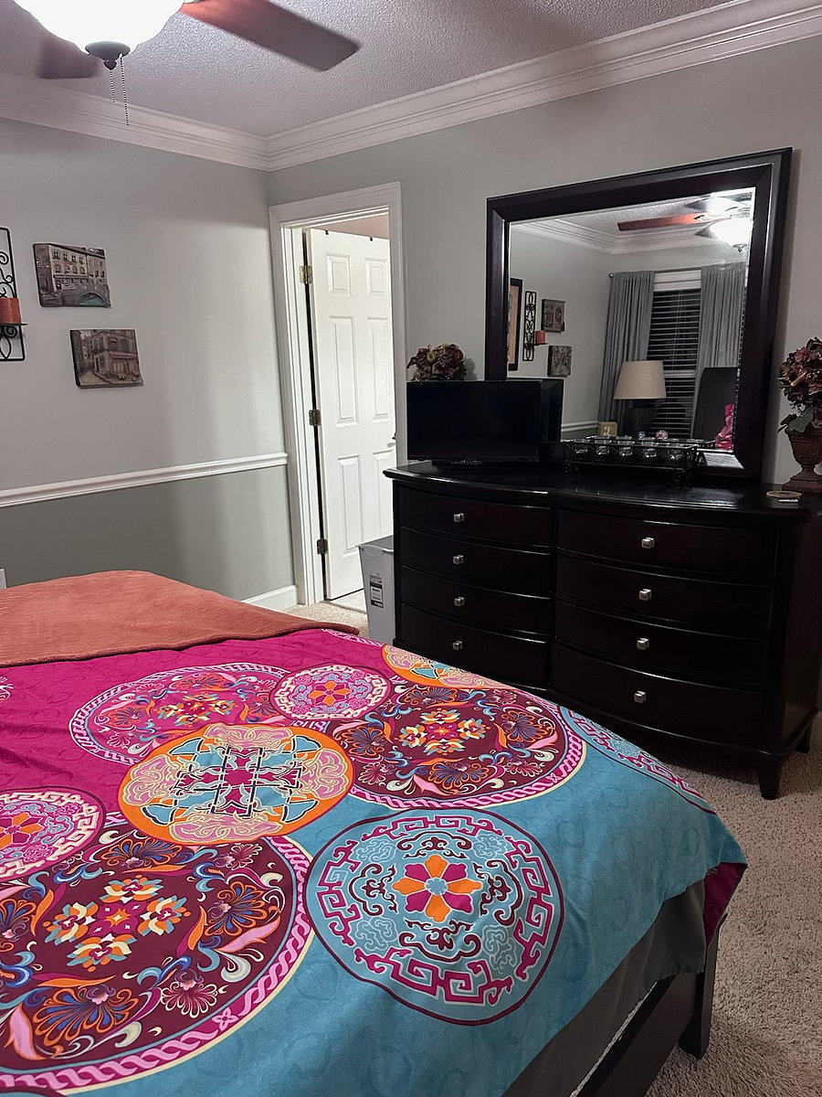Full large dresser and mirror with smart TV for use in master bedroom