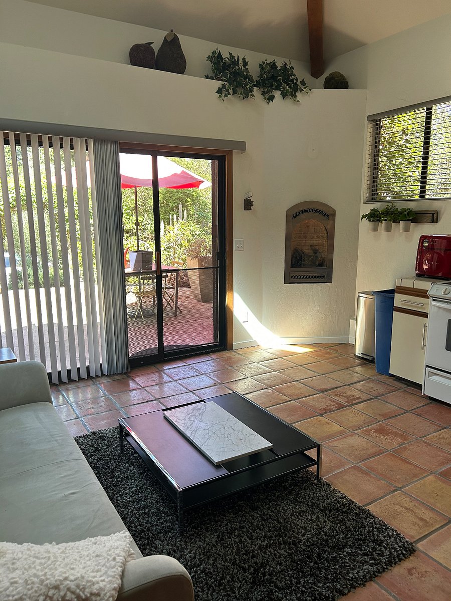 Main Floor Fireplace/Exit Door to Patio
