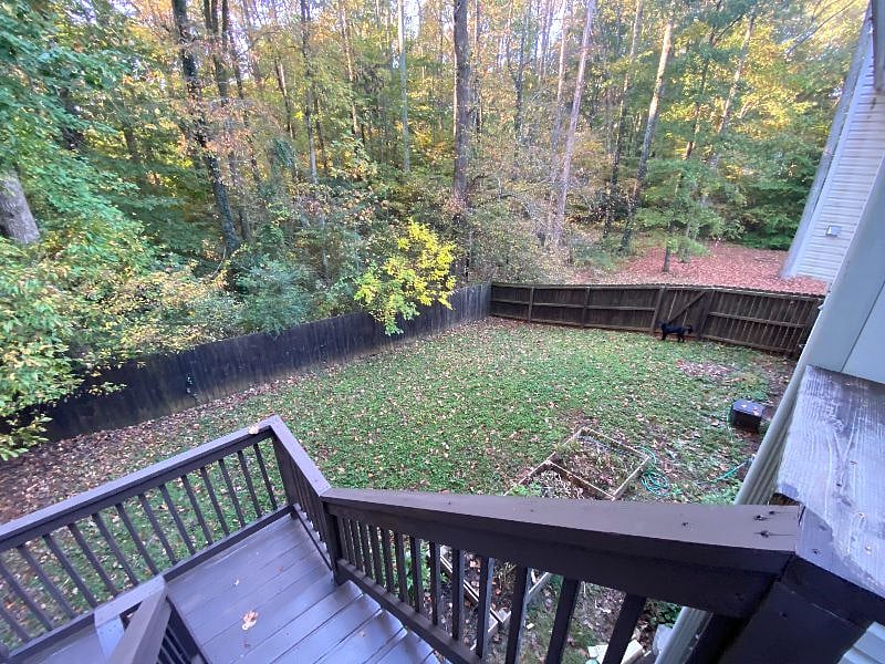 Stairs to fully fenced backyard