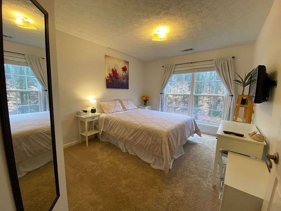 Upstairs bedroom with tv