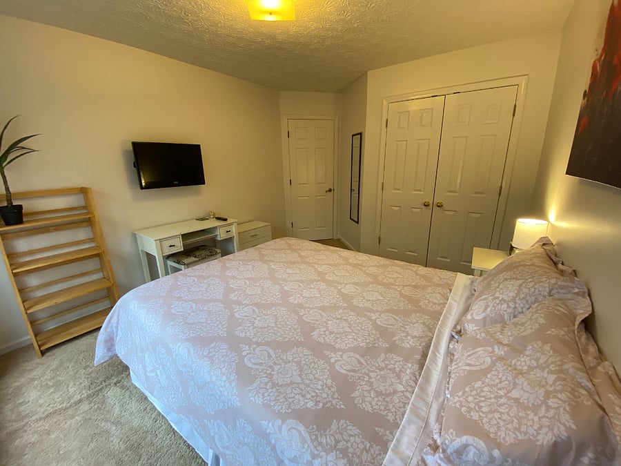 Upstairs bedroom with tv
