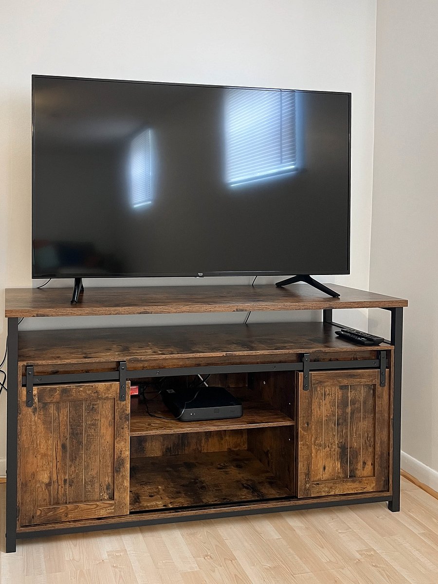 Large TV and Entertainment Stand