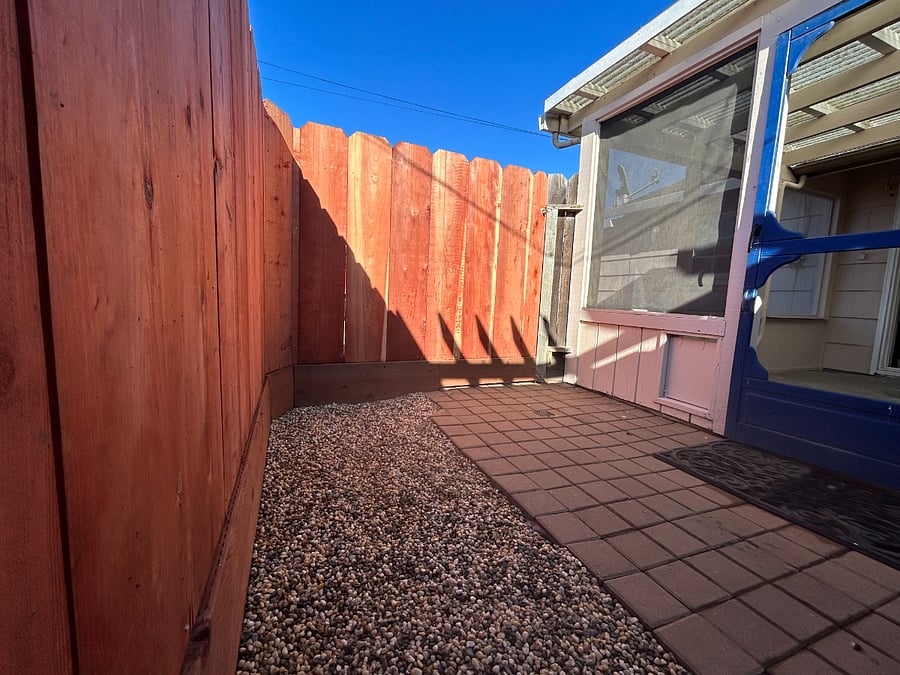 Small back patio, outside the screened in porch.