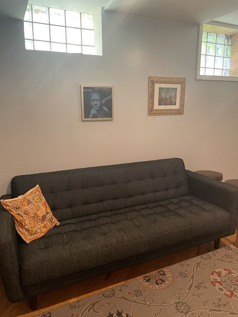 Downstairs garden apartment couch included.