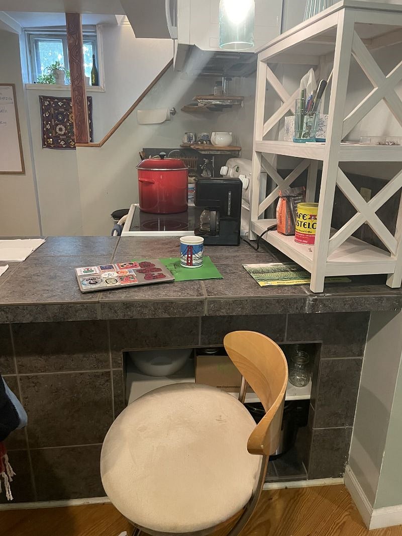 Downstairs garden apartment breakfast bar with cute bar stools.