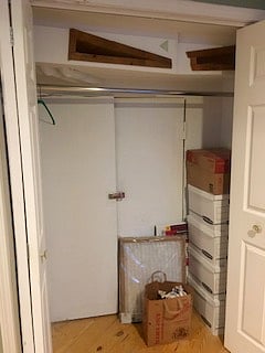 Clothes closet. Items are shown for scale.