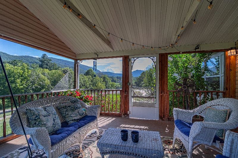 You are welcomed by a spacious front screened porch - Relax on the swing with your morning coffee viewing the beautiful mountains before heading to downtown Asheville or local breweries. Bigger families can gather together for fun and still have slee