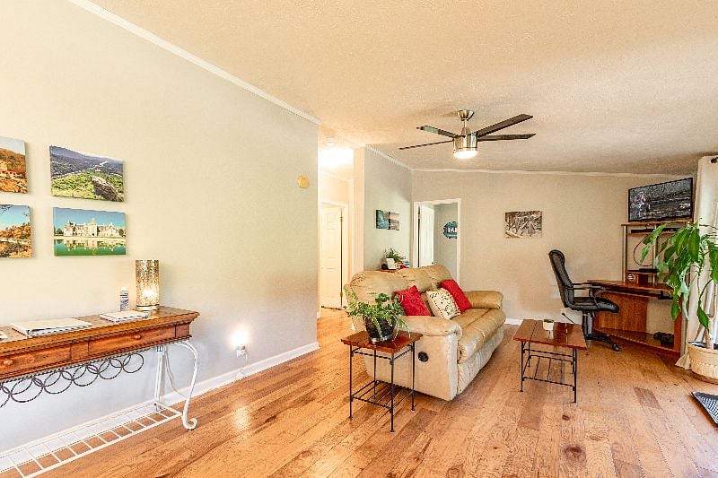 A secondary living area has TV/DVD to enjoy some movies, bookcase with games and children's books, desk in case you have to catch up on a little work before heading out to great local breweries like New Belguim, Catawba, Highland,or the Funkatorium.