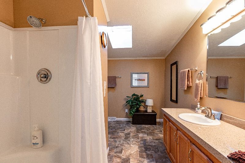 Your large Master Bathroom has an oversized shower with lots of counter space for 2 people to get ready for a night out in downtown Asheville. Provided is shampoo/conditioner, body wash, hand soap, makeup wipes, hair dryer, flat iron, and towels.