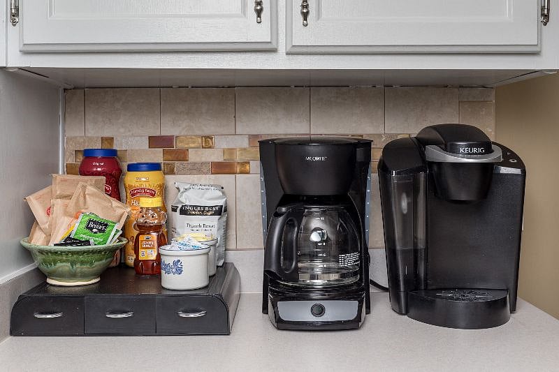 Your first stop in the morning is our coffee bar. We provide a Mr. Coffee pot and a Keurig with a nice selection of coffee, pods, tea, hot chocolate. We also provide sugar, sweetener, honey and powdered creamer.