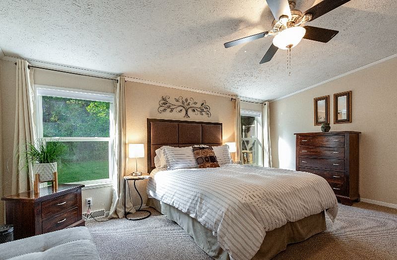 The large primary master bedroom has a comfortable Queen bed with cotton sheets perfect for a little rest after hiking the Blue Ridge Parkway. Lamps have USB chargers and there is white noise machine. It adjoins your own master bathroom.