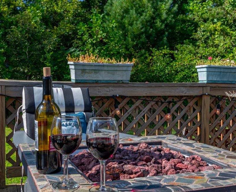 In the evening, cozy up on your private deck with glowing gas firepit. There is a grill for your steaks. With 9 chairs and a swing, you and your family have room to make memories.