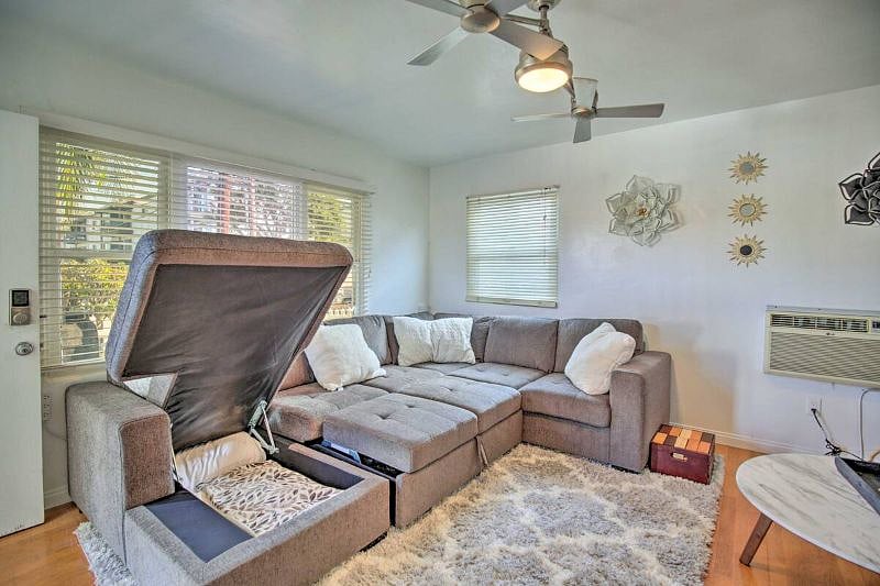 Full sized sectional/sleeper conversion with access to plenty of pillows and blankets. Two conveniently located power/phone charging locations.