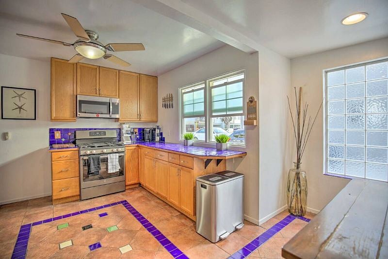 A large fully featured kitchen has everything you need for cooking and baking at home or hosting a party.