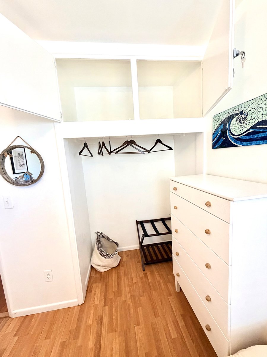 Spare bedroom with tons of over head storage. 