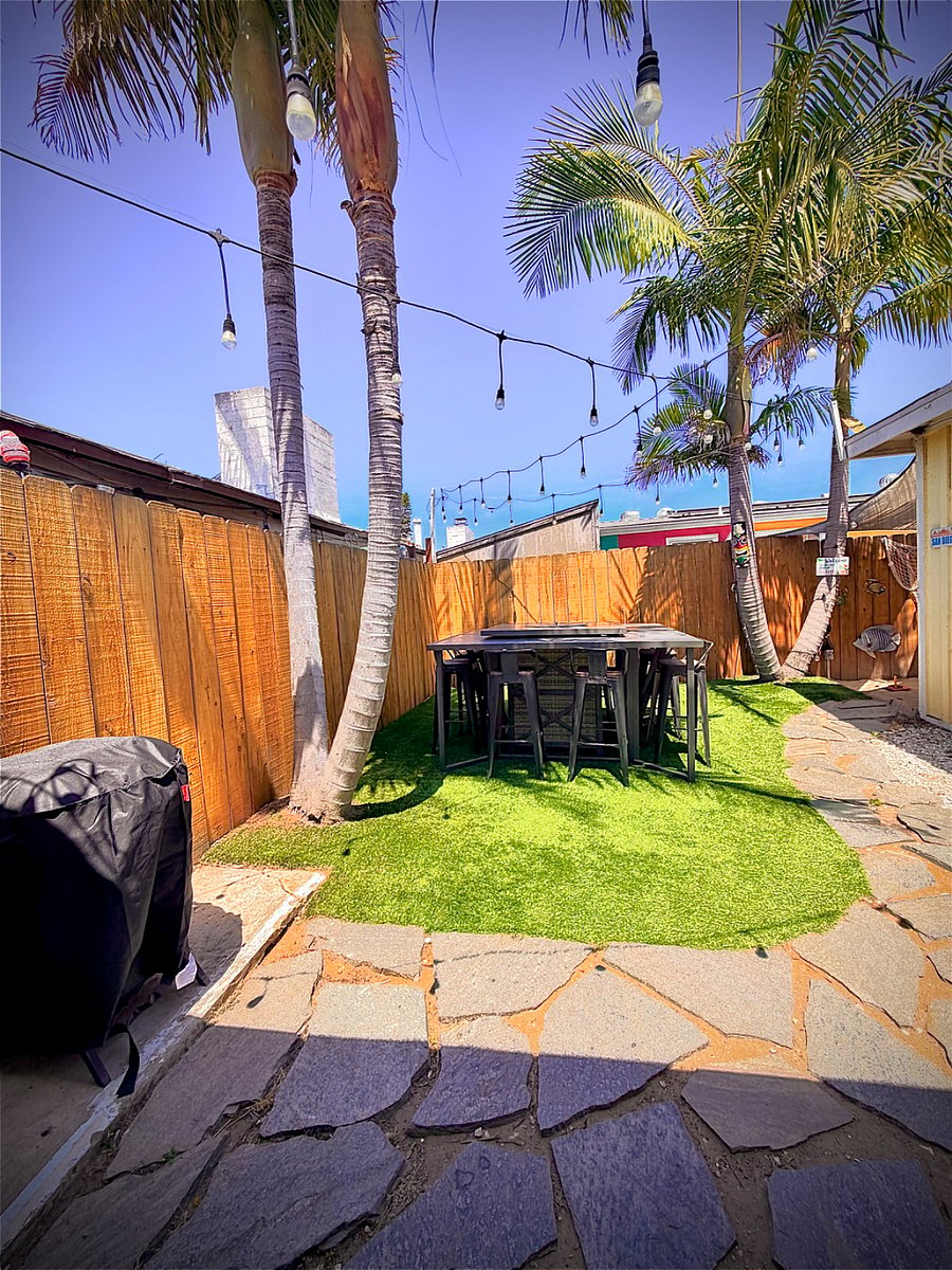 Brand new backyard privacy fencing with BBQ grill.  