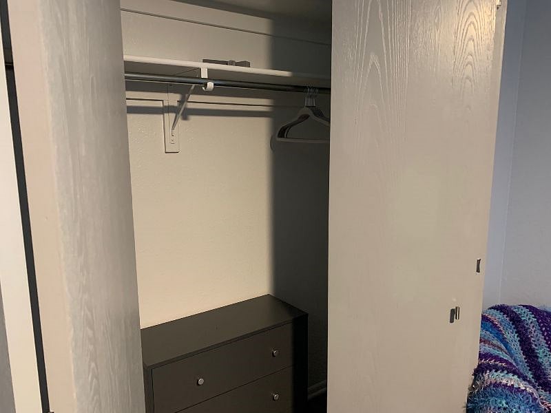 Blue bedroom closet