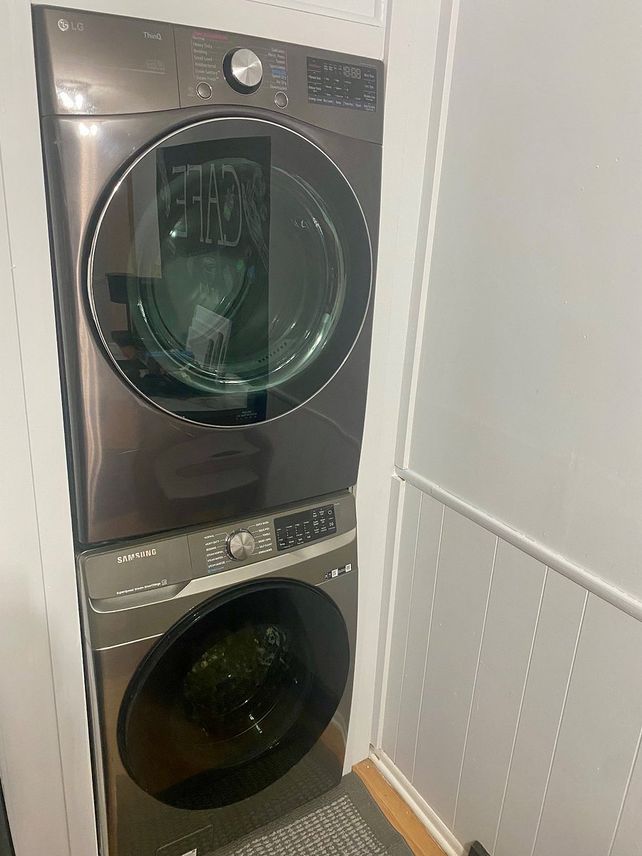 Laundry conveniently located in the kitchen.
