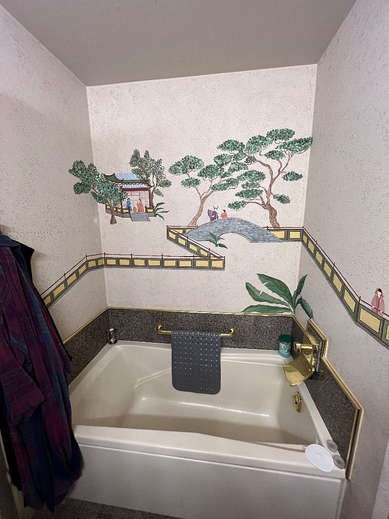 Deep soaking waterfall tub