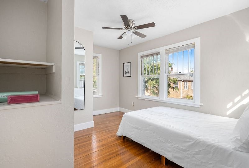 2nd bedroom upstairs with plush full bed and yoga/exercise equipment