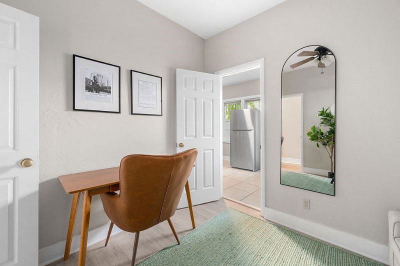 Office connects to kitchen with pass convenient pass through doors
