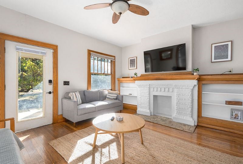 Light and bright family room with fireplace
