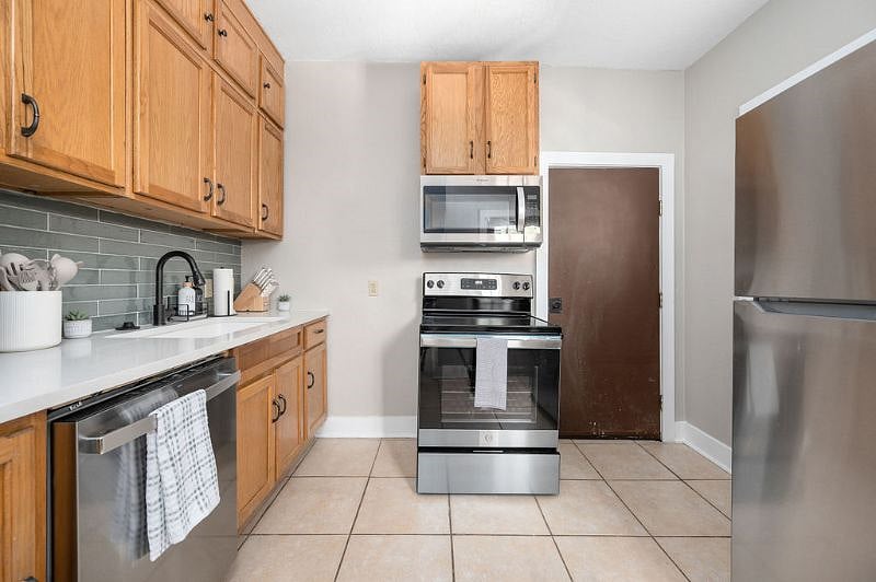 Kitchen connects to laundry room