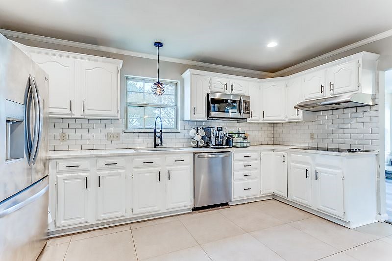 Full kitchen access includes pots, pans, oils, spices, coffee, creamer, tea, all appliances, rice maker, bread maker, grill, blender, essentials and extras you might need for a convenient stay.