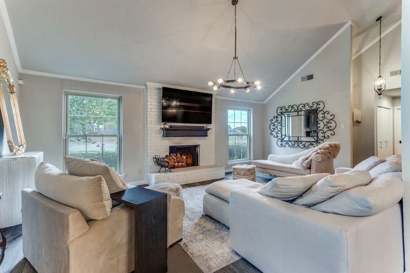 Living room with gas fireplace. Guests have access to all common areas.