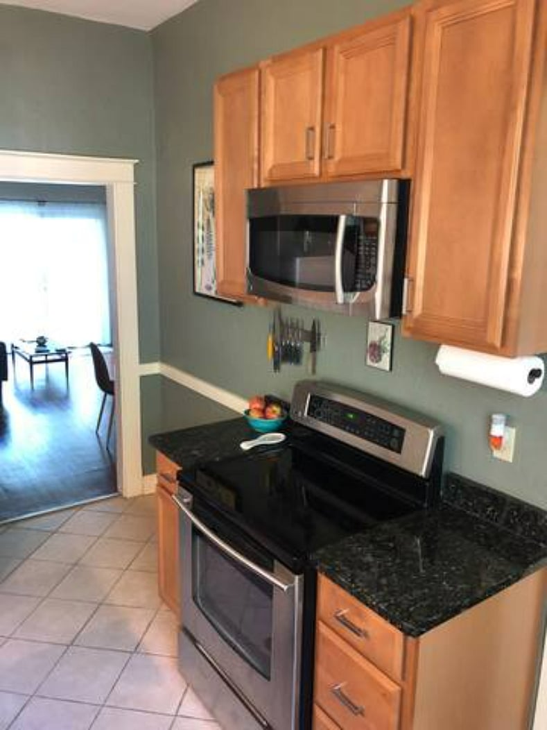 A fully stocked kitchen with all appliances and essentials readily available.