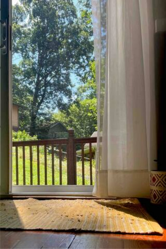 Looking out the sliding glass door to the side deck.