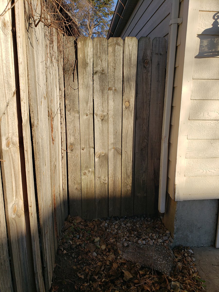 Gate entrance to backyard from off-street driveway parking