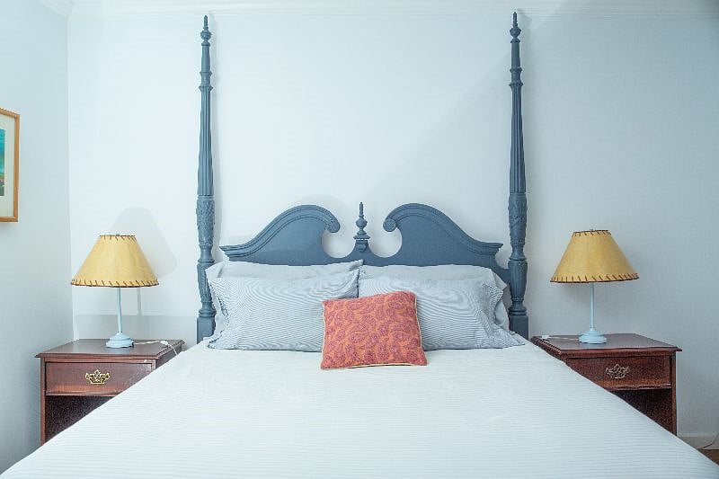 Queen bed downstairs. Cooler room for summer months.