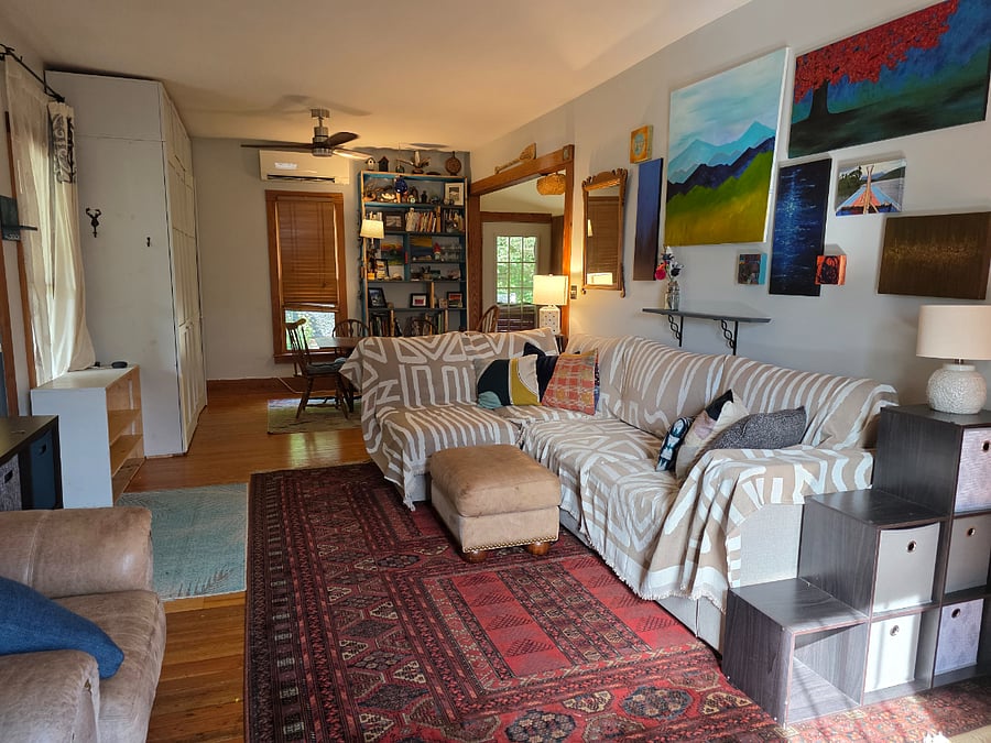 Upstairs living room with large comfortable couch.