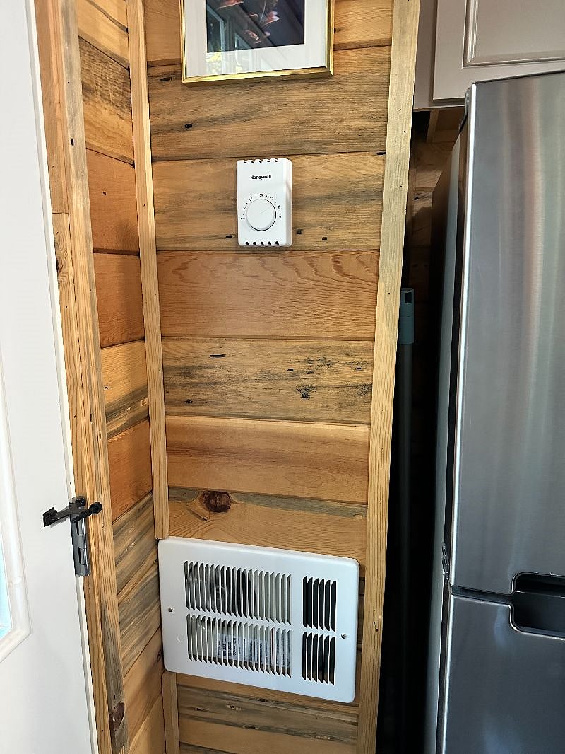 This is the thermostat and in wall heater. It heats the house up very efficiently and quickly. Its also very easy to use. 
