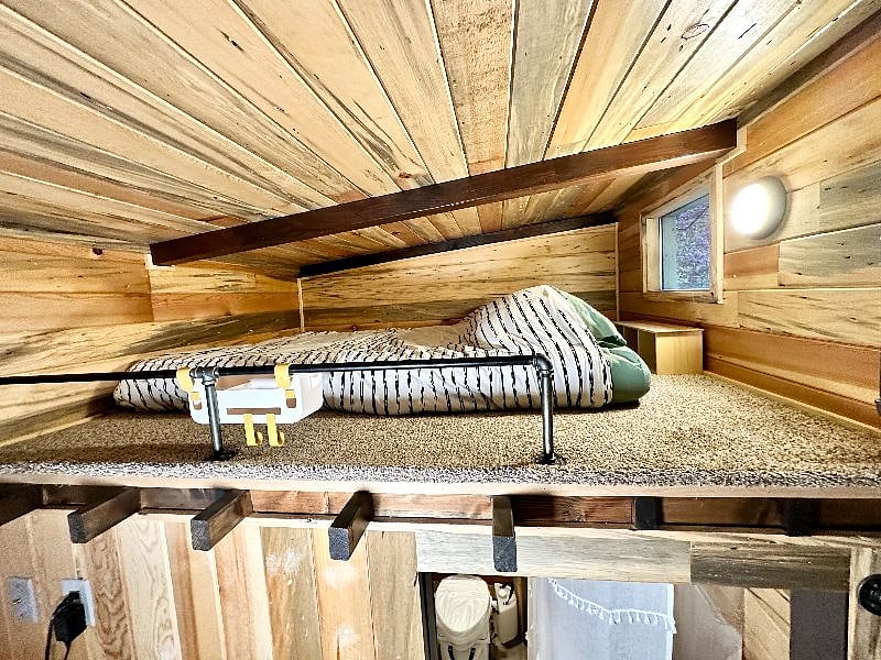 This is the lofted bed. Full size mattress. Sleeps two. Brand new bedding and mattress.