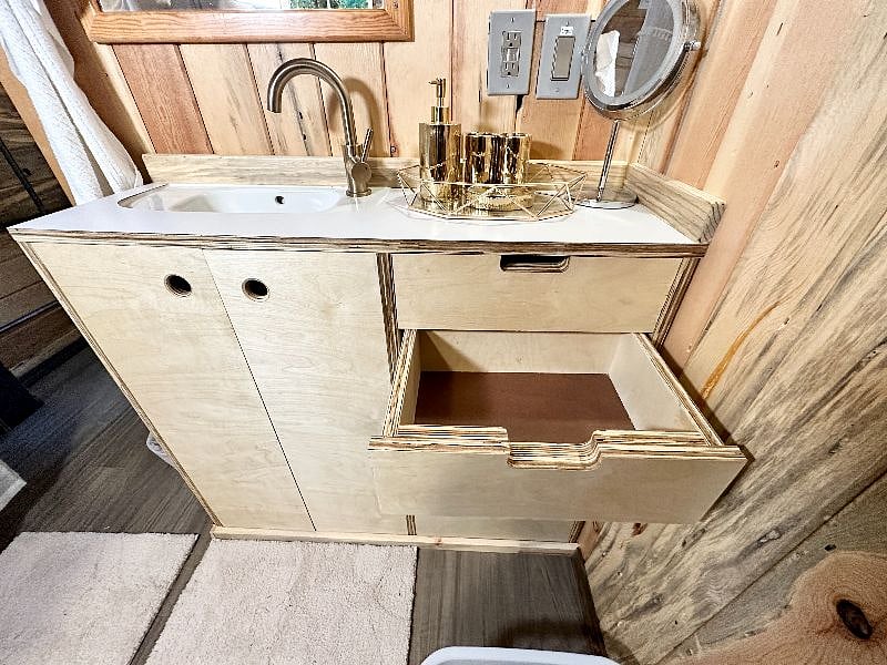 Lots of storage in the custom built bathroom vanity.