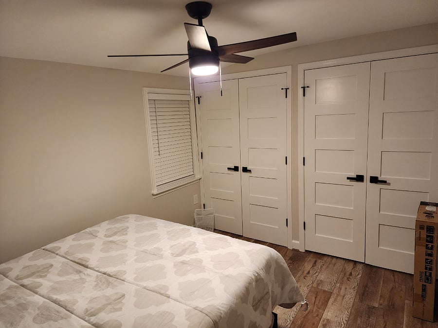 Upper level guest beedroom#2 equipped with dresser, 32 inch TV, laundry basket, linnens and towels.